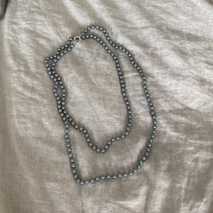 Long gray pearl necklace